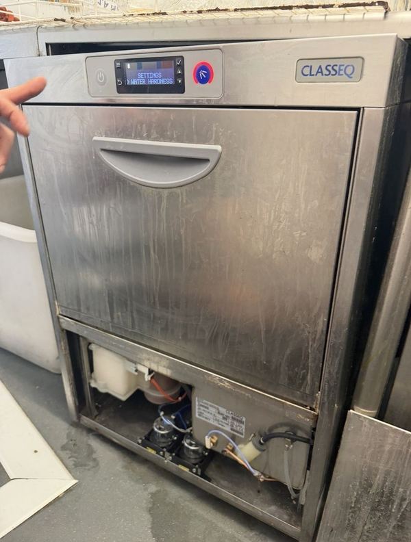 Classeq glasswasher with the lower panel off for repair