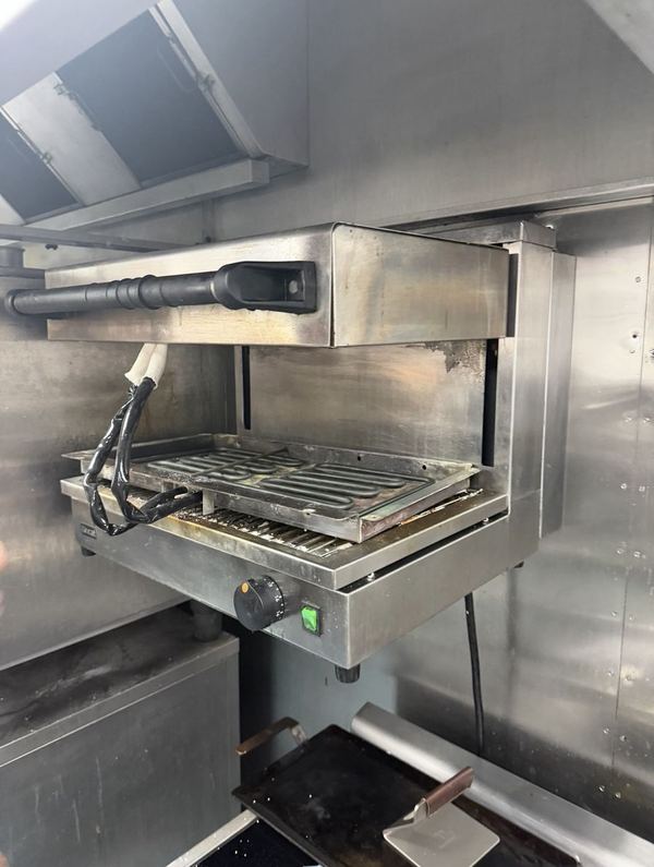 Commercial salamander grill working again after a repair